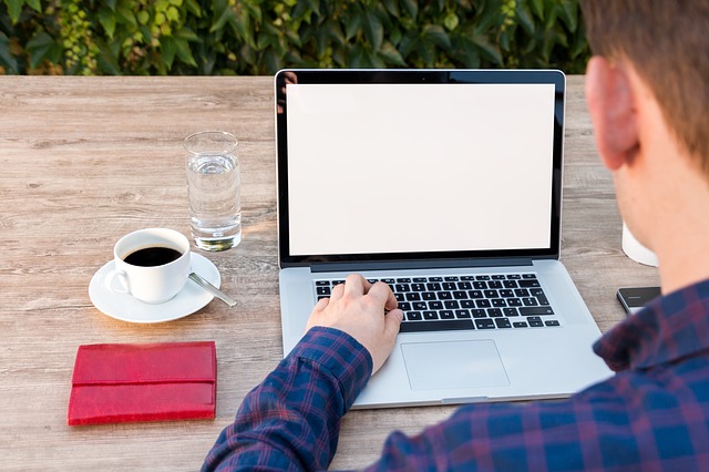 laptop on table, outdoors